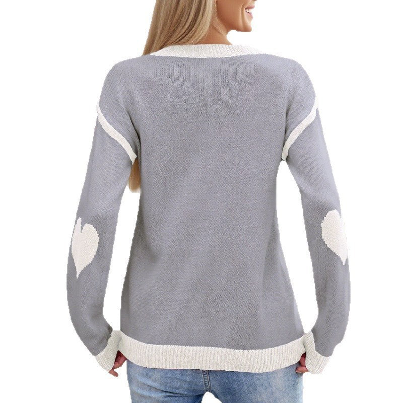 Female With Hearts Peach Round Neck Sweater